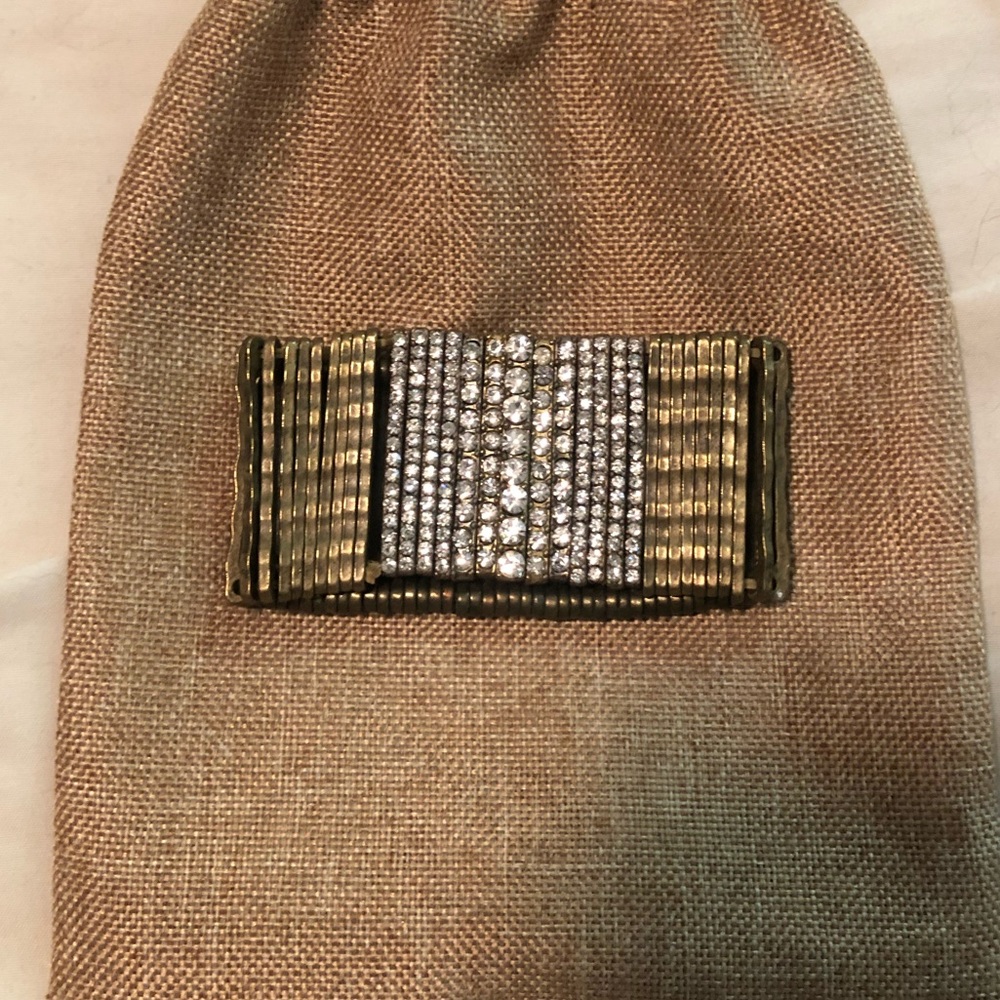 J.Crew diamond (faux) and gold elastic bracelet.